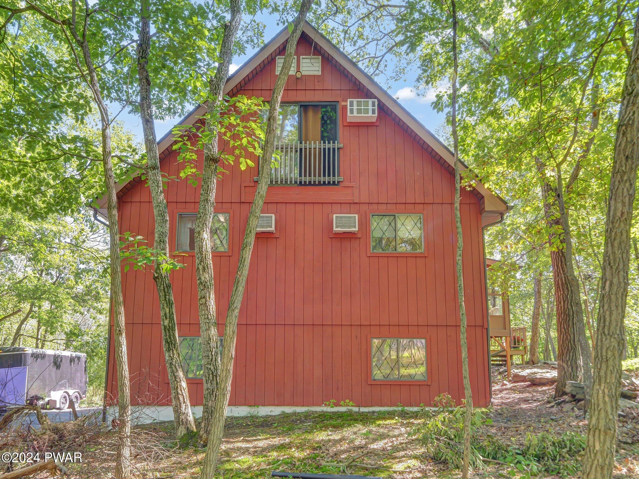 3178 Cherry Ridge Road Bushkill, PA 18324 - Photo 36 of 54 a view of a house with a yard