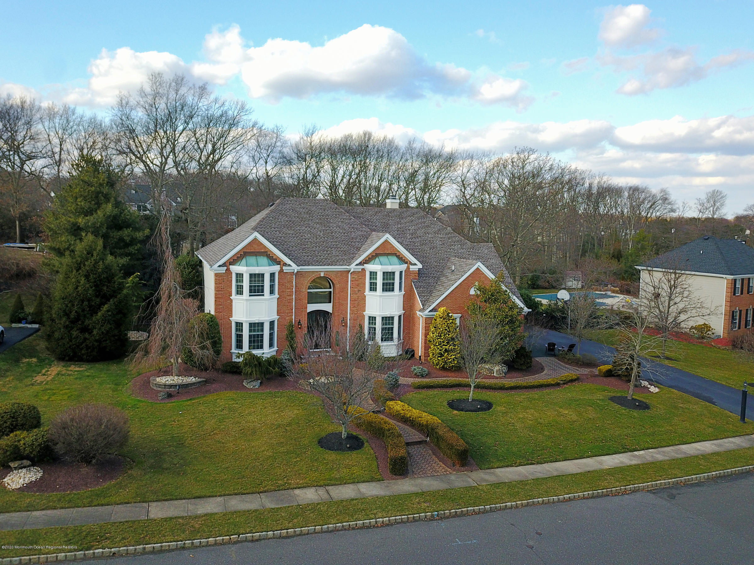 2411 Apple Ridge Circle Manasquan, NJ 08736 - Photo 2 of 37 an aerial view of a house