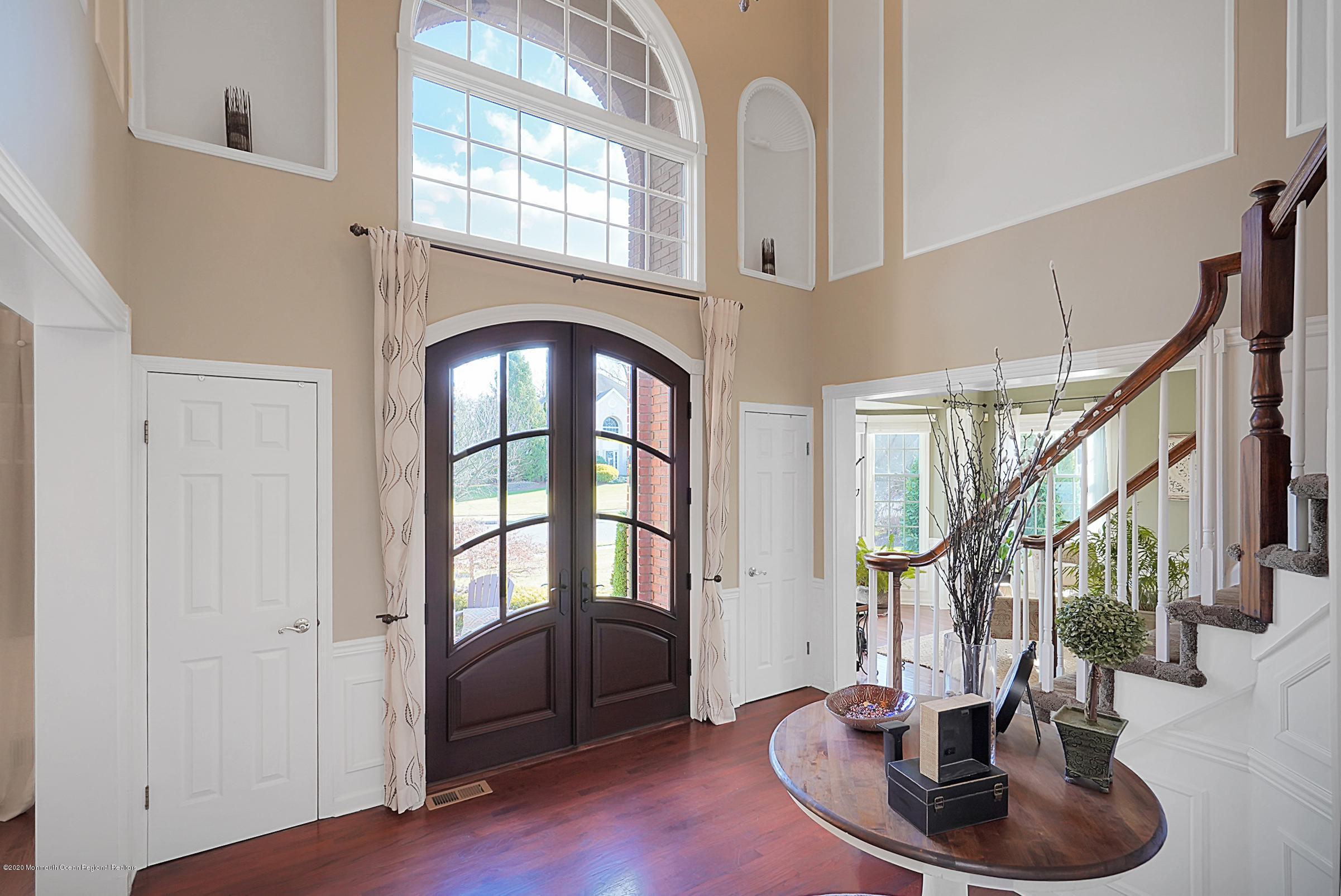 2411 Apple Ridge Circle Manasquan, NJ 08736 - Photo 15 of 37 a view of entryway and hall with wooden floor