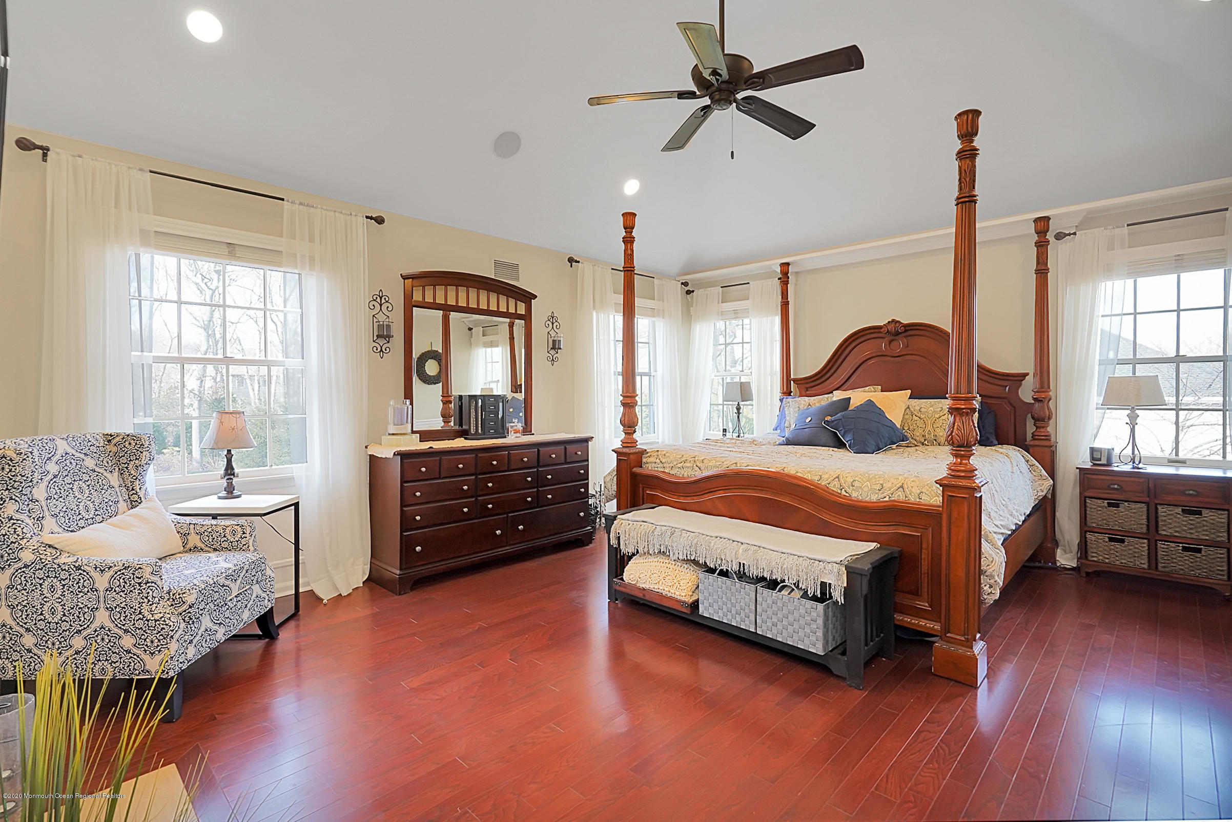 2411 Apple Ridge Circle Manasquan, NJ 08736 - Photo 22 of 37 a bedroom with a bed and wooden floor