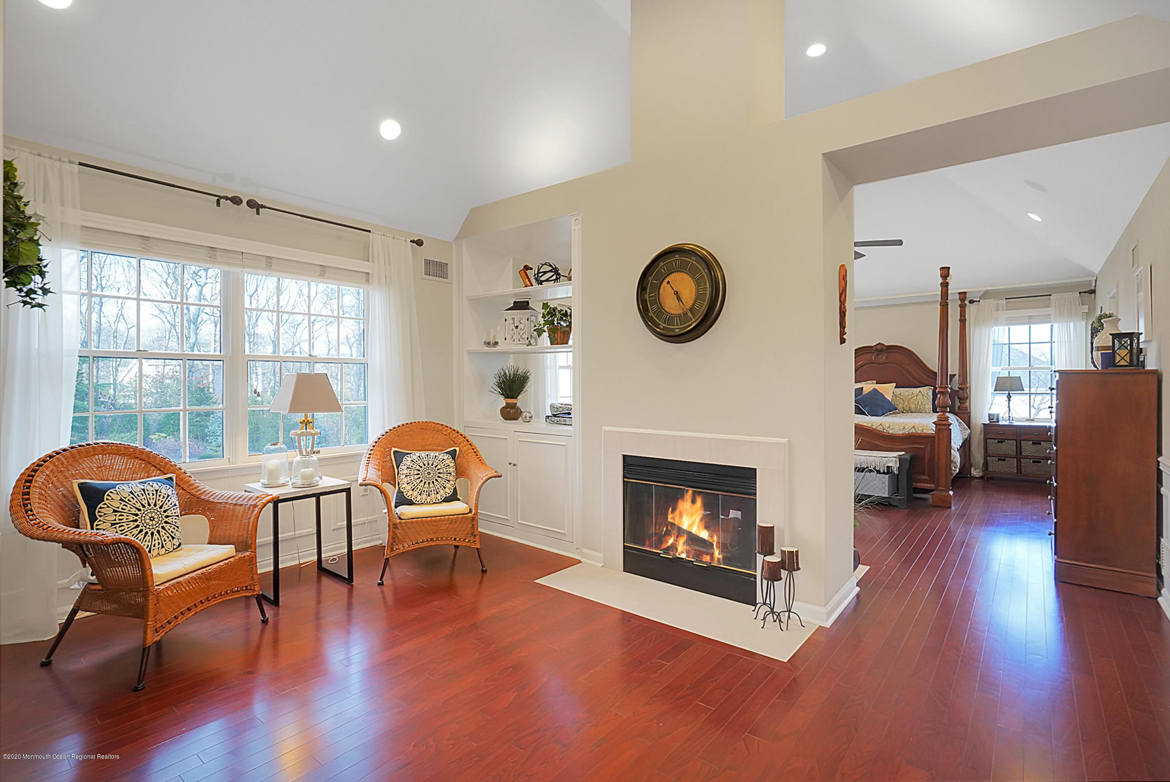 2411 Apple Ridge Circle Manasquan, NJ 08736 - Photo 23 of 37 a living room with furniture and a fireplace
