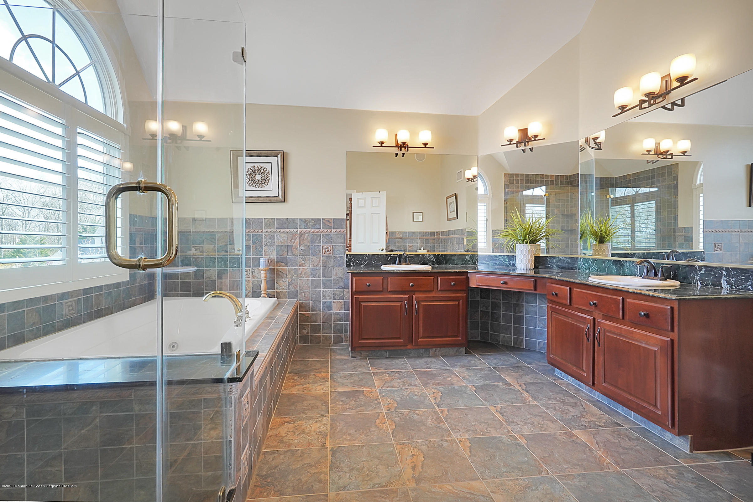 2411 Apple Ridge Circle Manasquan, NJ 08736 - Photo 24 of 37 a large bathroom with a large tub and sink