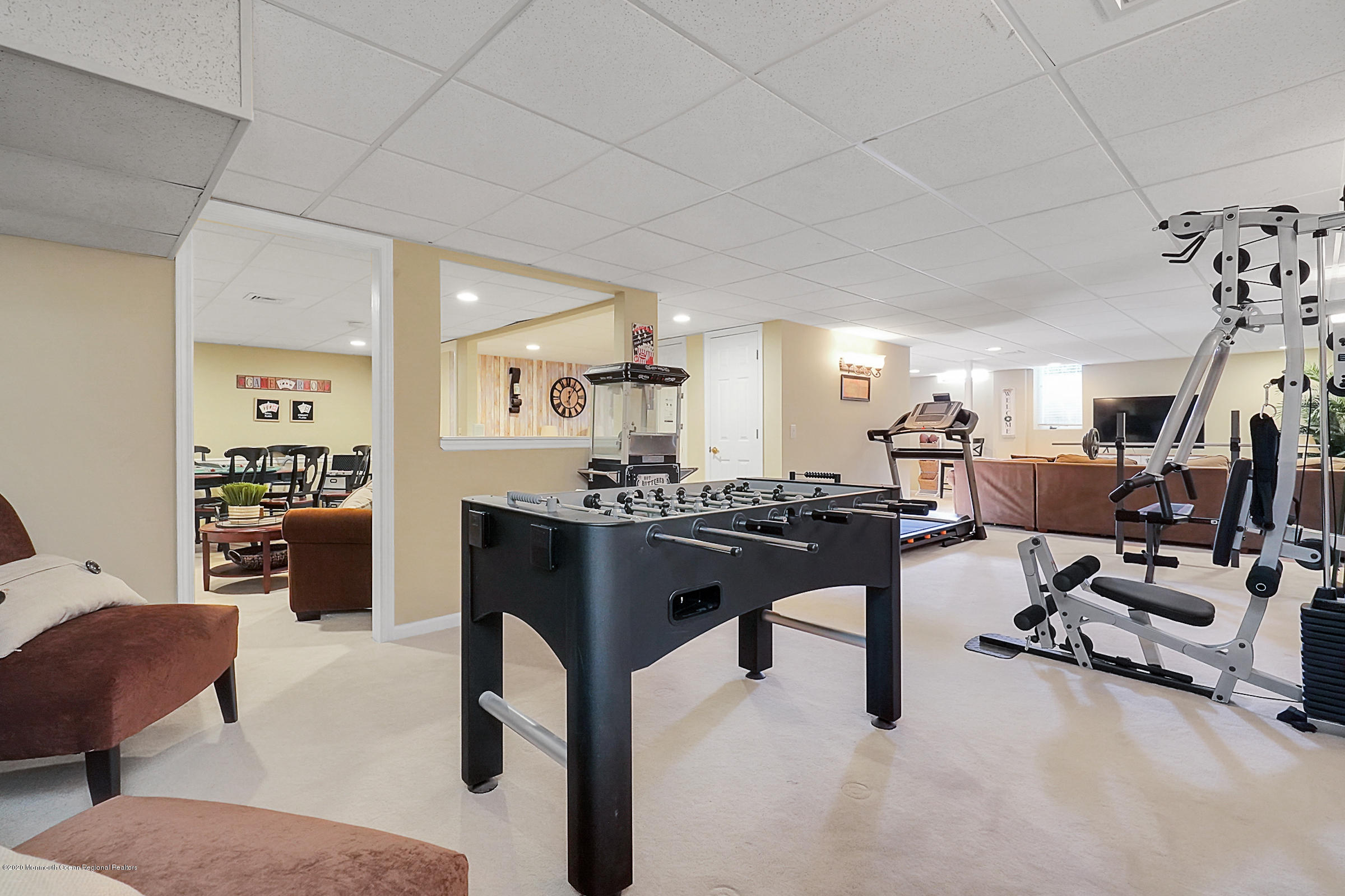 2411 Apple Ridge Circle Manasquan, NJ 08736 - Photo 26 of 37 a room with lots of chairs and mirrors