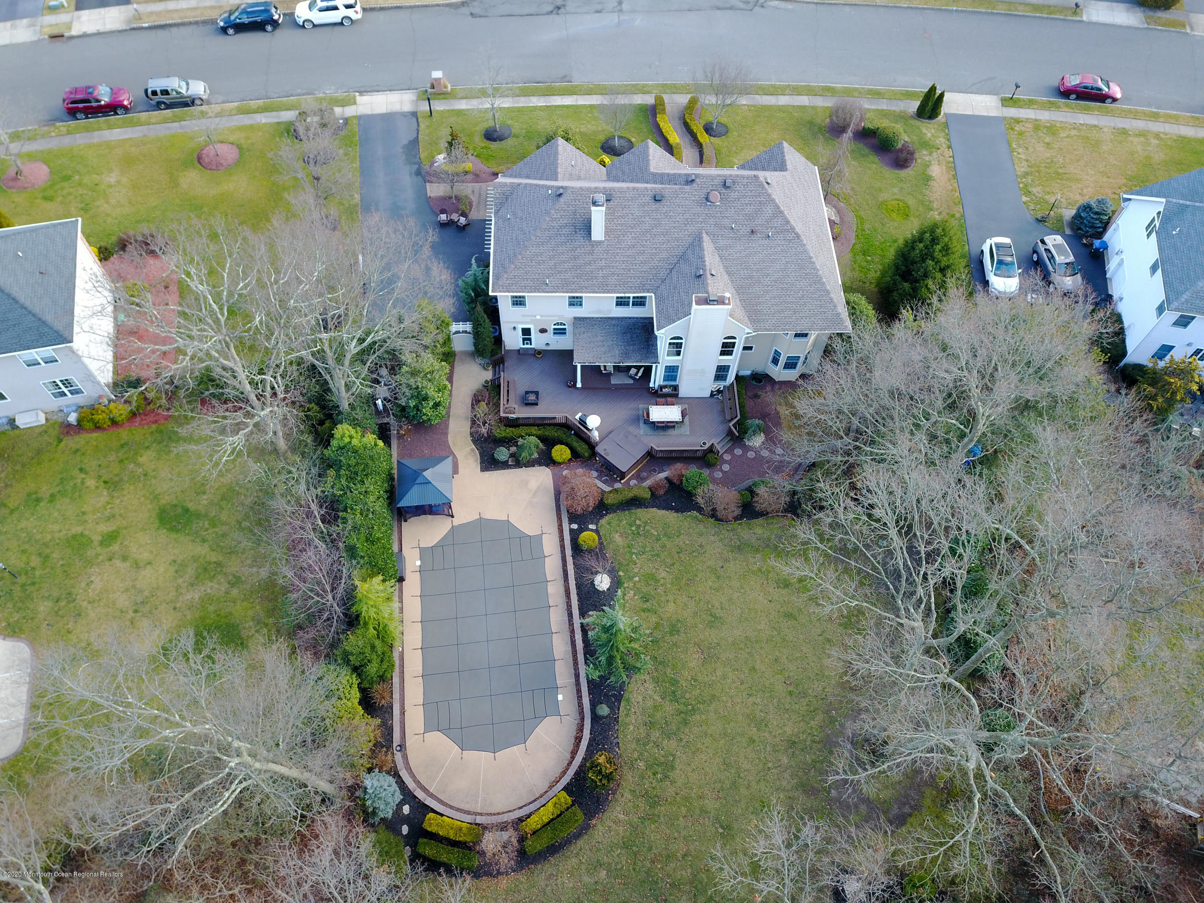 2411 Apple Ridge Circle Manasquan, NJ 08736 - Photo 36 of 37 an aerial view of a house with a swimming pool