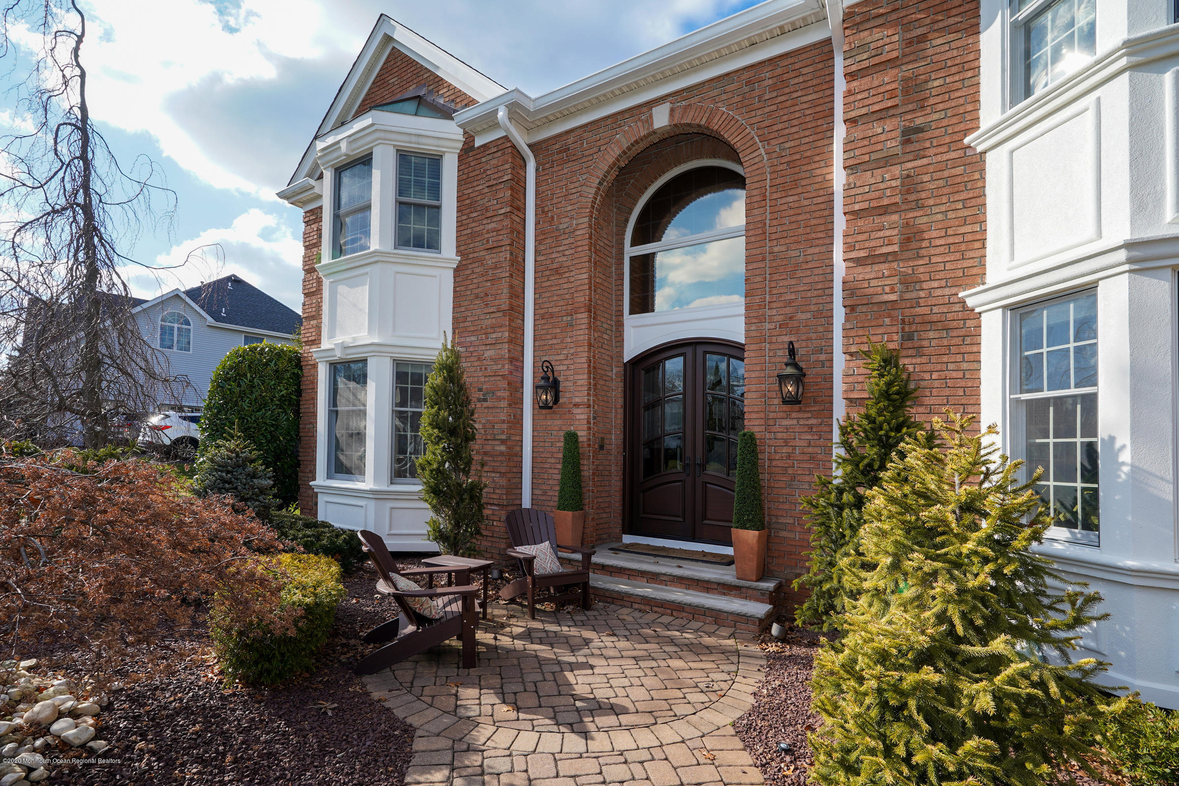 2411 Apple Ridge Circle Manasquan, NJ 08736 - Photo 5 of 37 a front view of a house