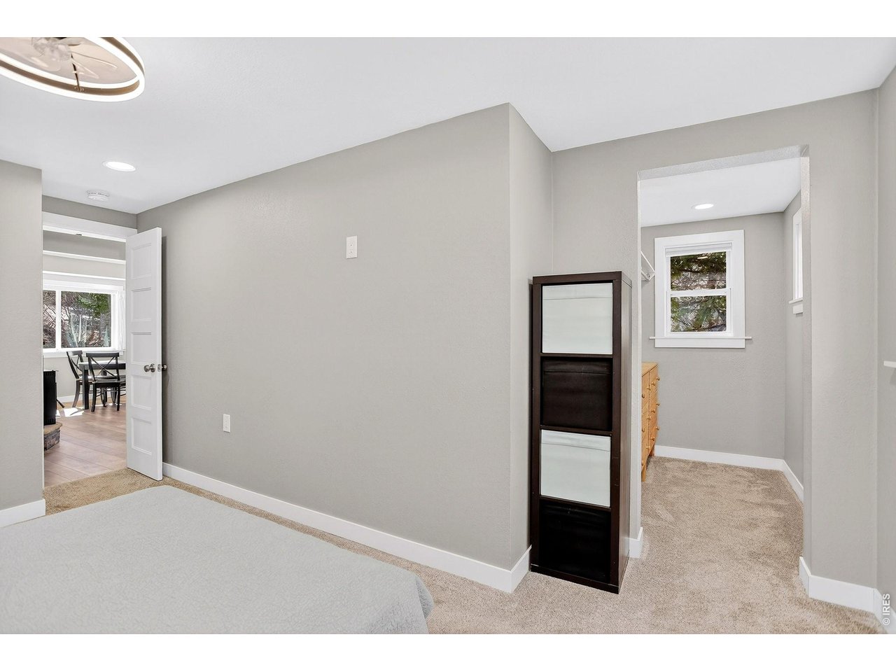 11826 Brook Road Golden, CO 80403 - Photo 14 of 28 Primary Bedroom to Walk In Closet (Right) & Living Room (Left)