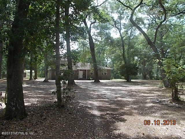 96539 Blackrock Road Yulee, FL 32097 - Photo 1 of 26 a view of road with trees