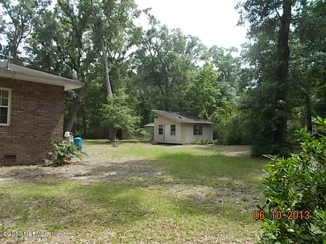96539 Blackrock Road Yulee, FL 32097 - Photo 12 of 26 a house with a tree in front of it