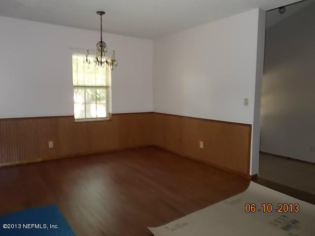 96539 Blackrock Road Yulee, FL 32097 - Photo 18 of 26 a view of an empty room with a window