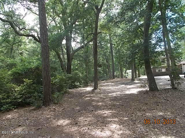 96539 Blackrock Road Yulee, FL 32097 - Photo 9 of 26 a view of a forest with trees