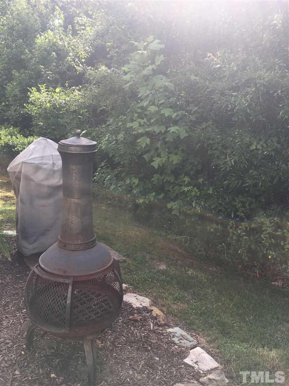 2614 Wyntercrest Lane Durham, NC 27713 - Photo 16 of 19 a view of a water fountain in the yard