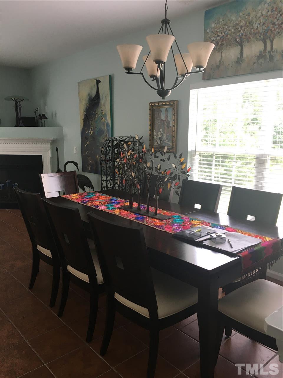 2614 Wyntercrest Lane Durham, NC 27713 - Photo 4 of 19 a view of a dining room with furniture and window