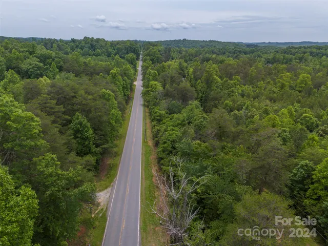 a view of a big yard with green space