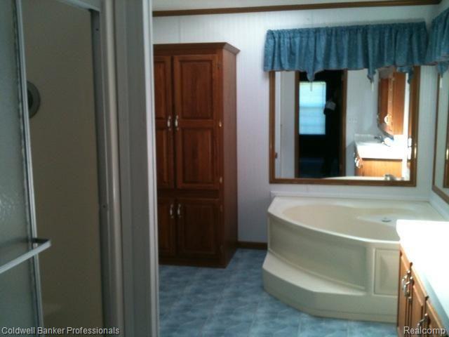 4393 Skelton Road Columbiaville, MI 48421 - Photo 11 of 13 Master bathroom