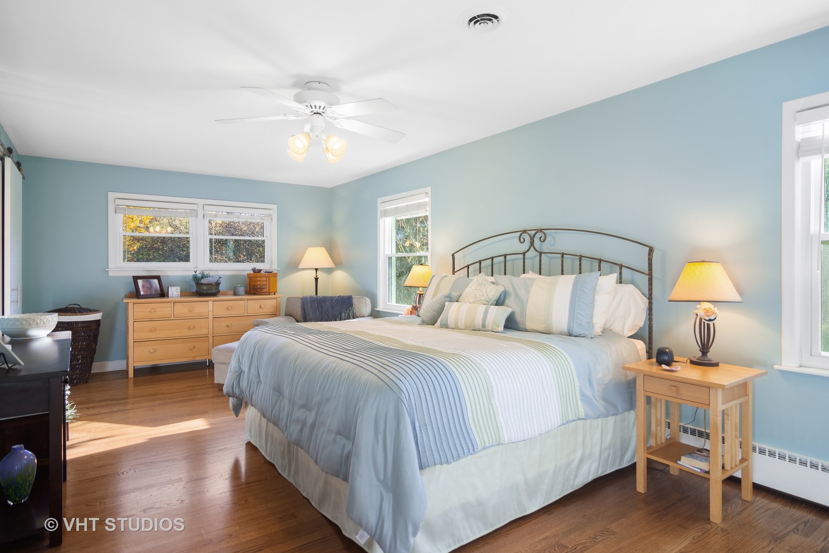 1857 Thomas Atkinson Road Inverness, IL 60067 - Photo 16 of 40 a bedroom with a bed and wooden floor