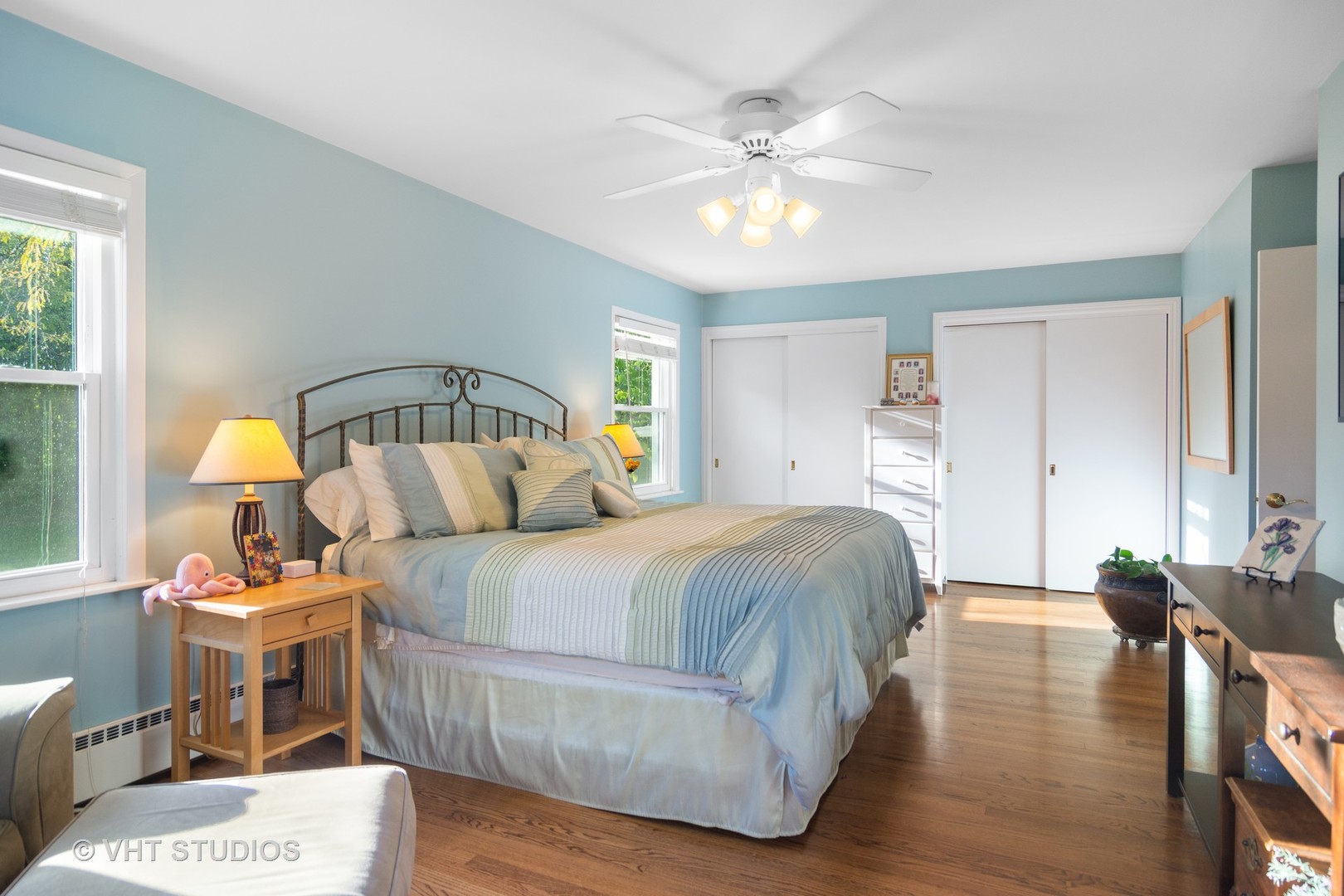 1857 Thomas Atkinson Road Inverness, IL 60067 - Photo 17 of 40 a spacious bedroom with a bed and a chandelier