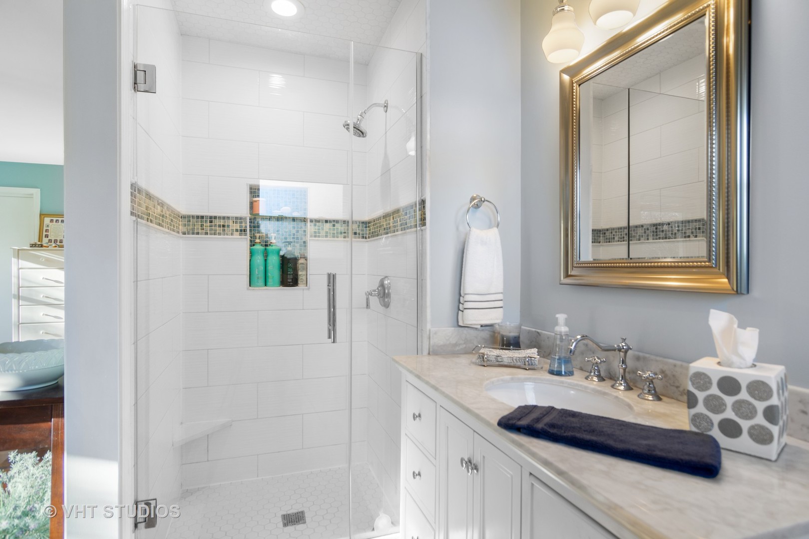 1857 Thomas Atkinson Road Inverness, IL 60067 - Photo 20 of 40 a bathroom with a granite countertop sink mirror and a shower