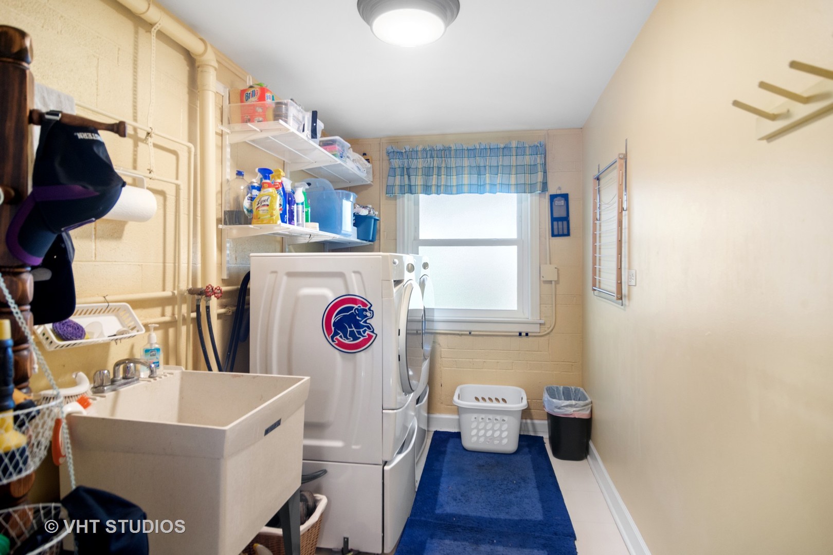 1857 Thomas Atkinson Road Inverness, IL 60067 - Photo 25 of 40 a utility room with dryer washer and a view of living room