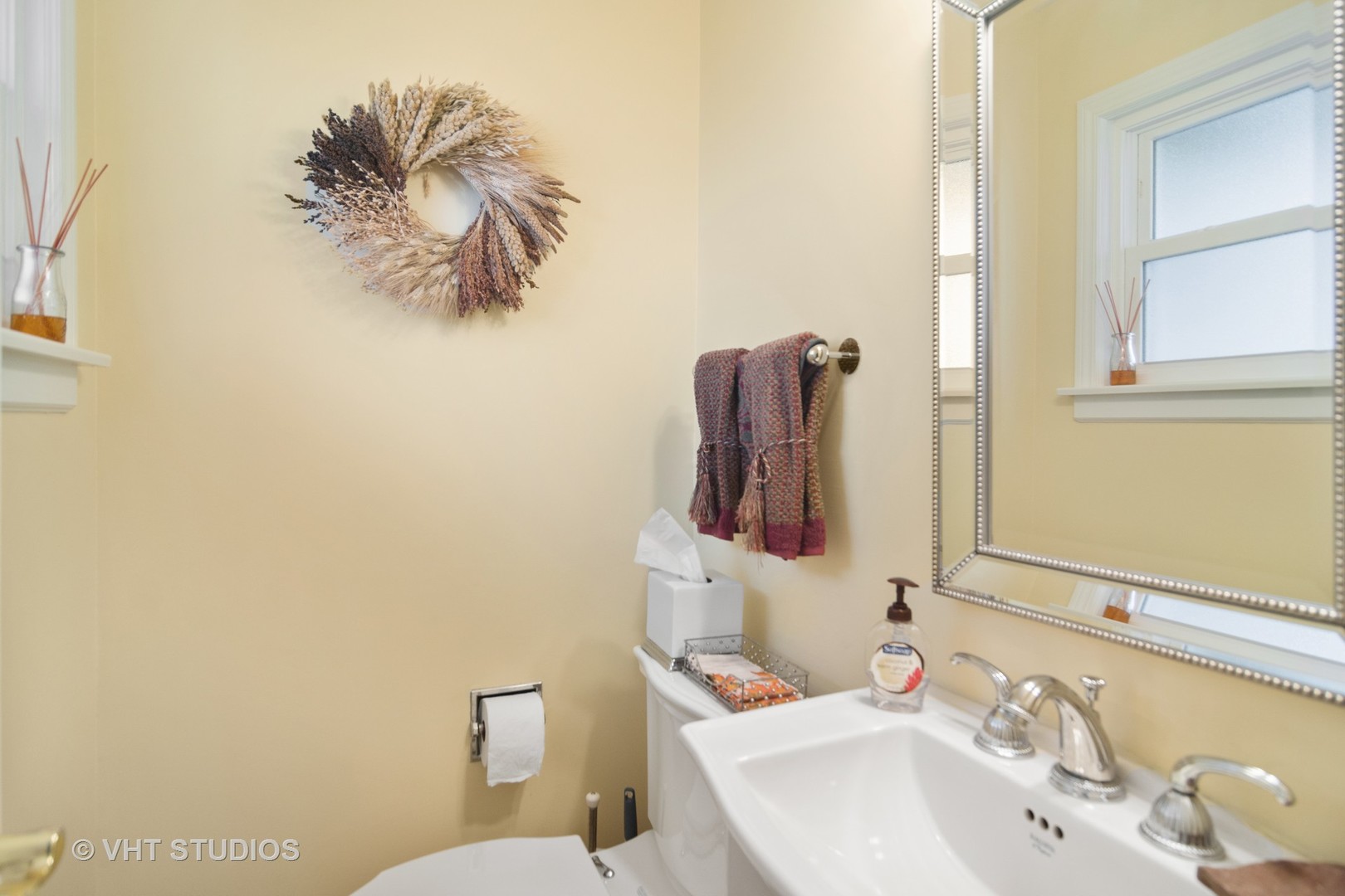 1857 Thomas Atkinson Road Inverness, IL 60067 - Photo 26 of 40 a bathroom with a toilet sink and mirror