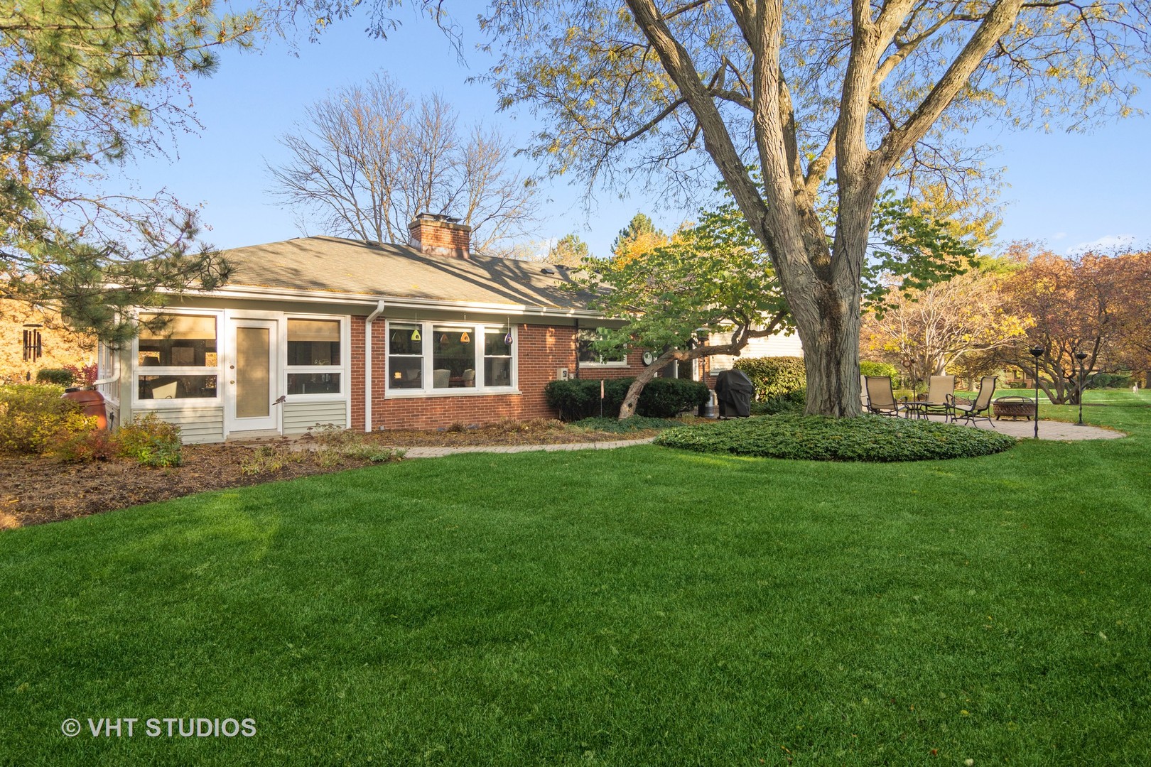 1857 Thomas Atkinson Road Inverness, IL 60067 - Photo 30 of 40 a front view of a house with a garden