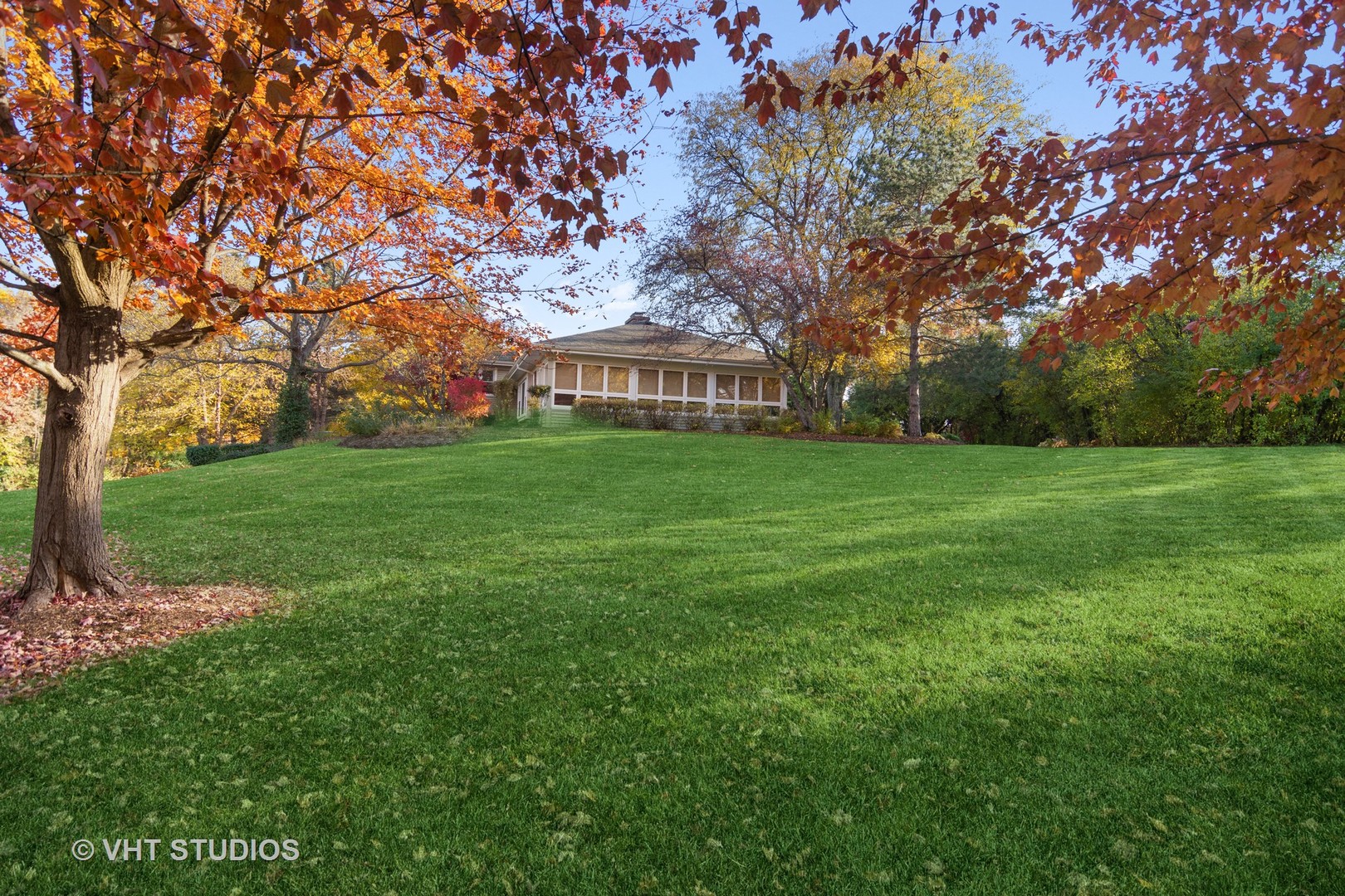 1857 Thomas Atkinson Road Inverness, IL 60067 - Photo 32 of 40 a front view of a house with a garden
