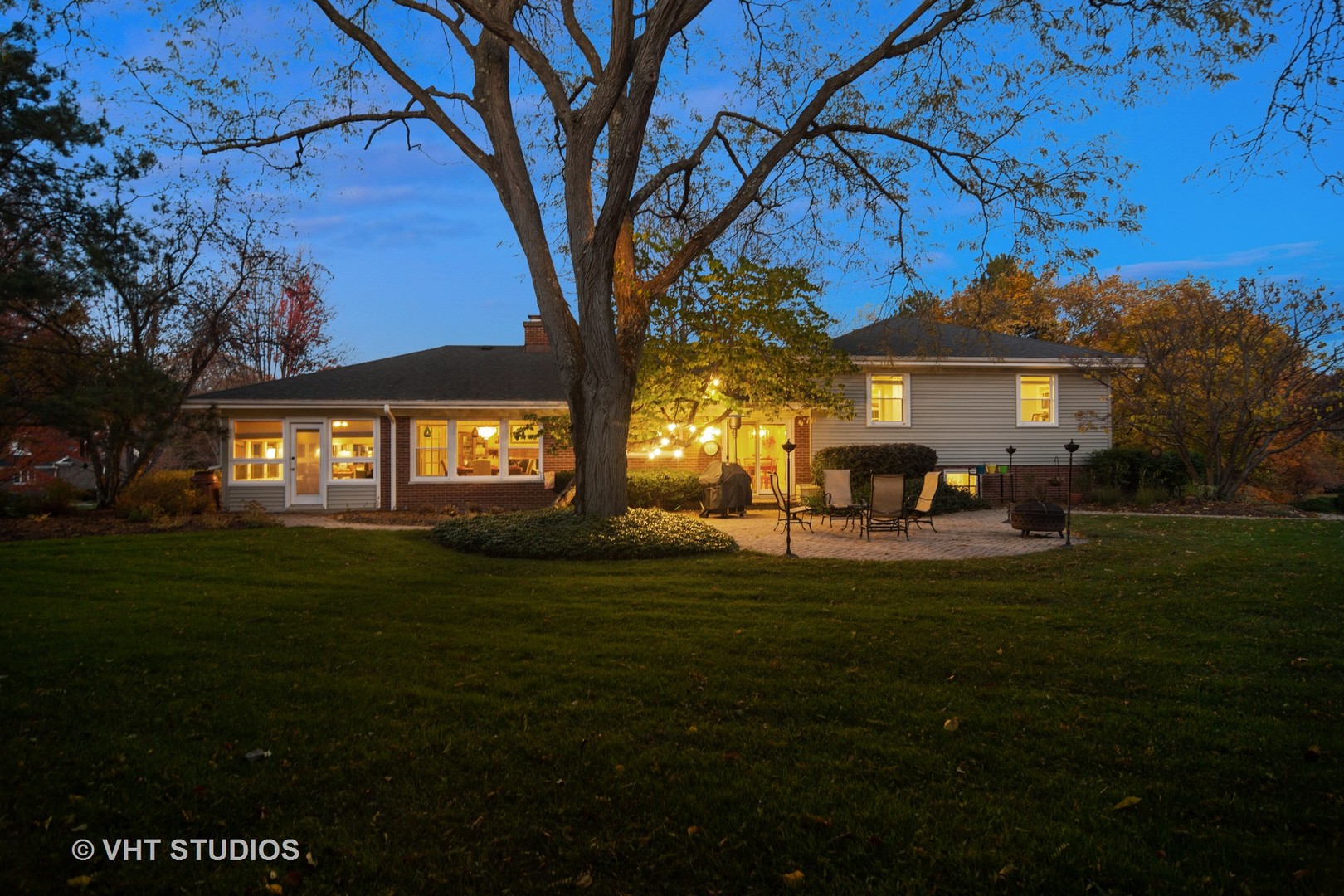 1857 Thomas Atkinson Road Inverness, IL 60067 - Photo 35 of 40 a front view of a house with a garden