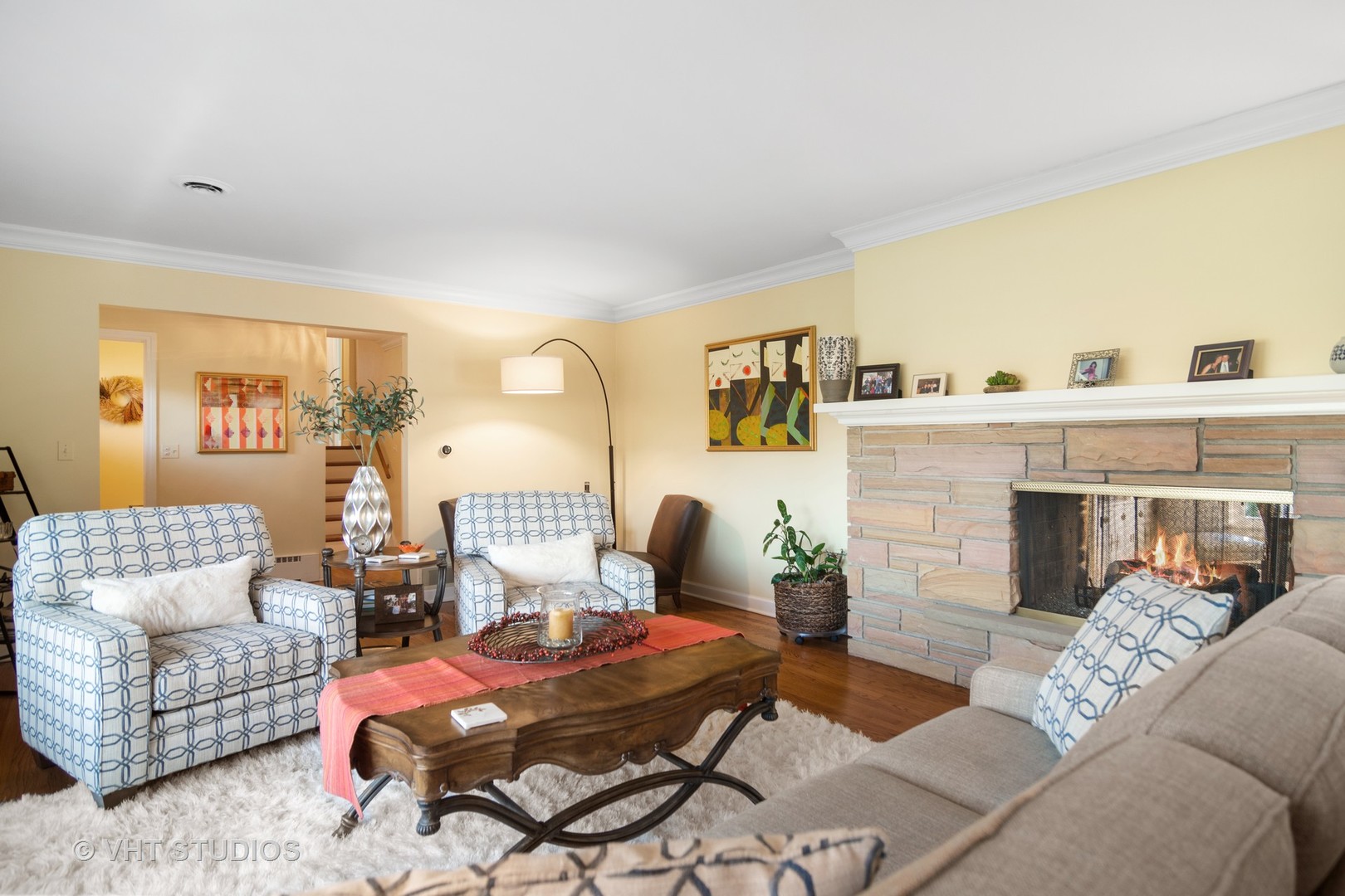 1857 Thomas Atkinson Road Inverness, IL 60067 - Photo 5 of 40 a living room with furniture and a fireplace