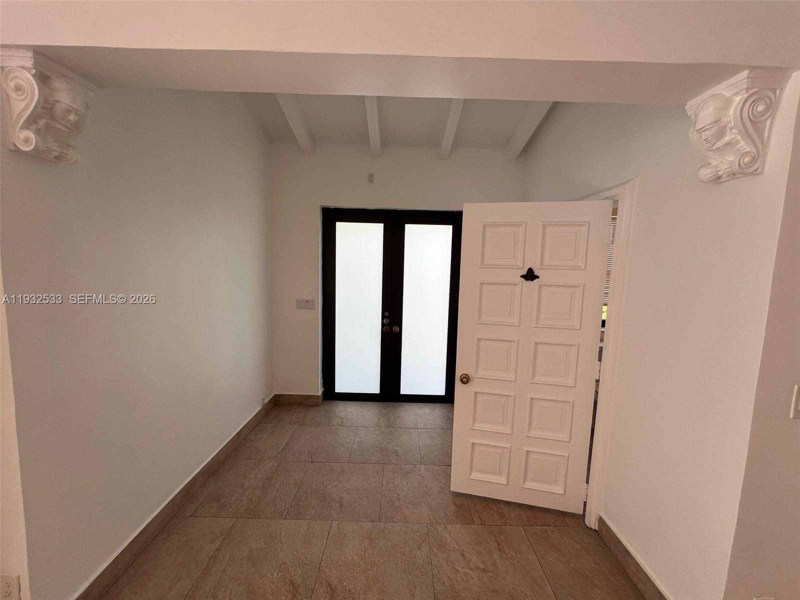 4575 Post Avenue Miami Beach, FL 33140 - Photo 13 of 57 a view of a hallway with closet