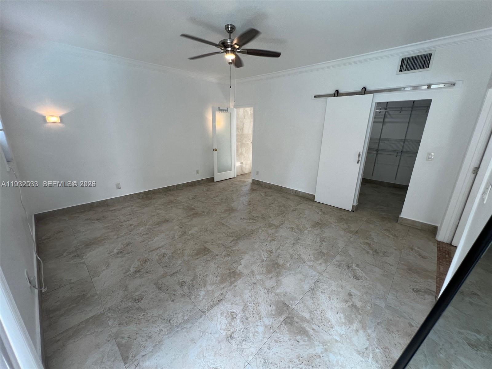 4575 Post Avenue Miami Beach, FL 33140 - Photo 23 of 57 wooden floor in an empty room