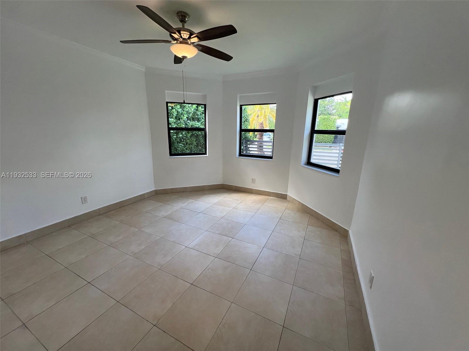 4575 Post Avenue Miami Beach, FL 33140 - Photo 47 of 57 a view of an empty room with a window