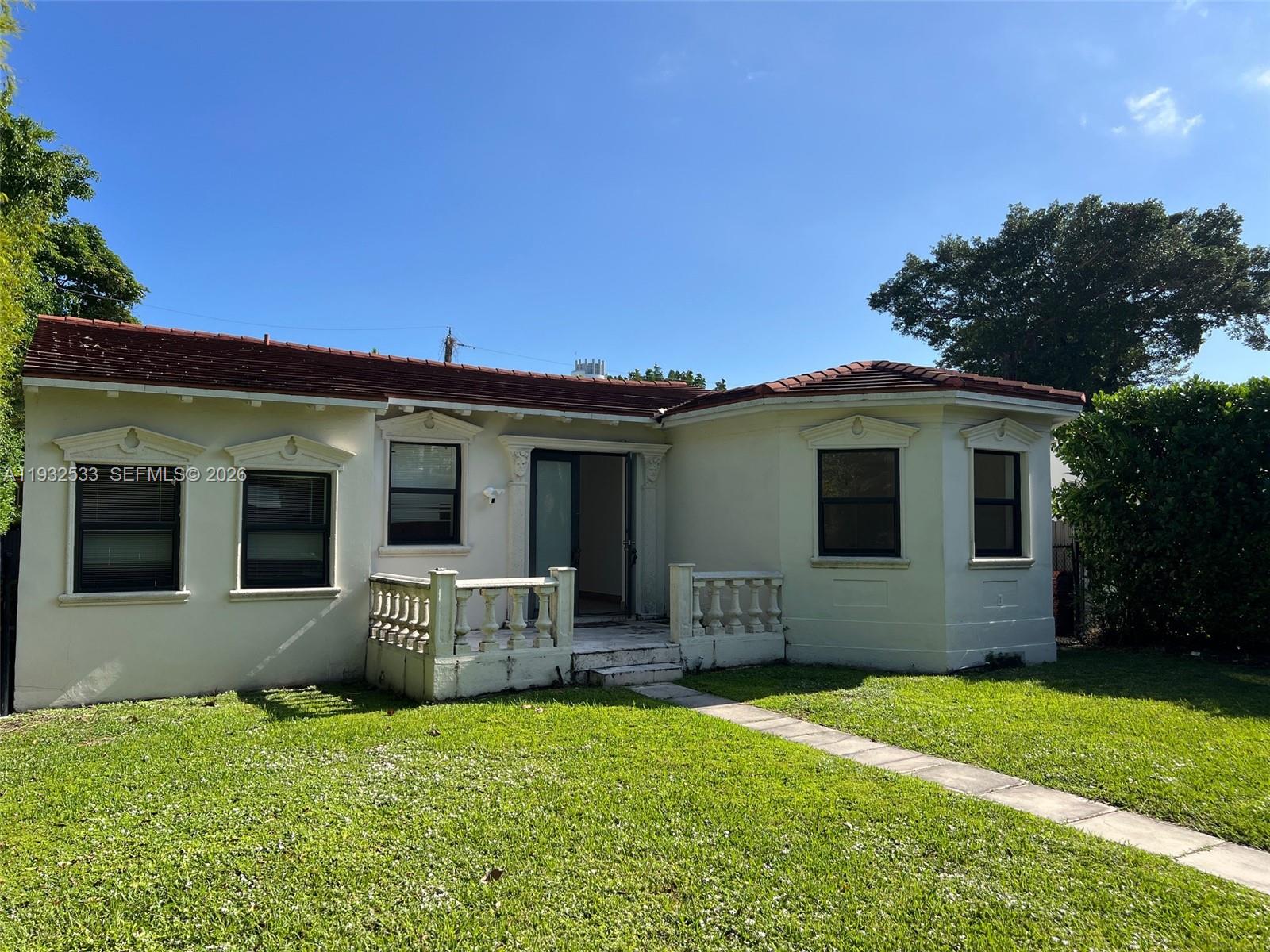 4575 Post Avenue Miami Beach, FL 33140 - Photo 5 of 57 a house view with a garden space