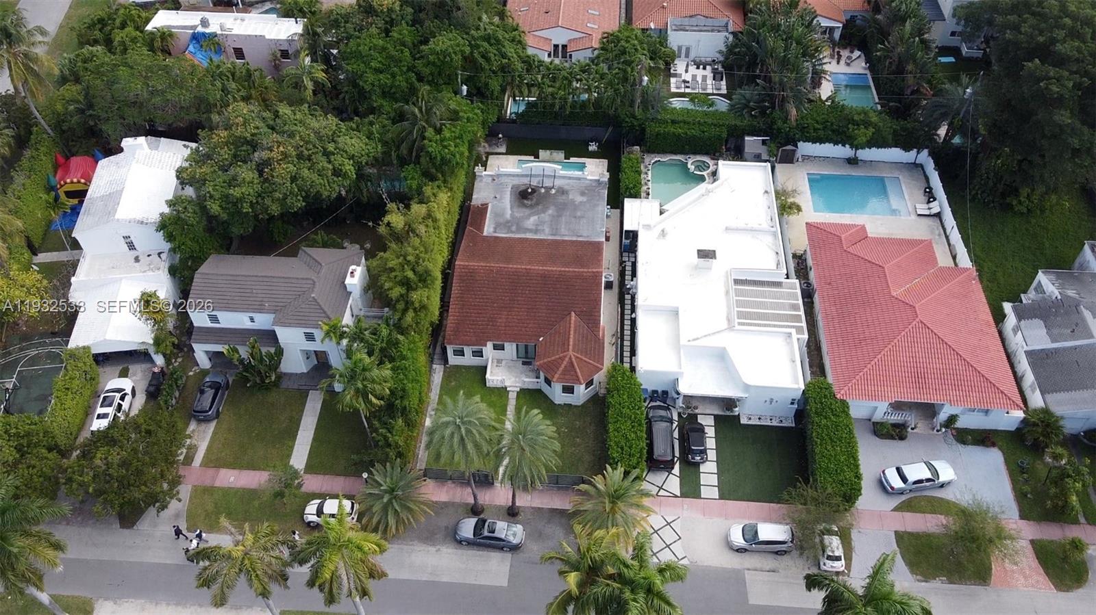 4575 Post Avenue Miami Beach, FL 33140 - Photo 57 of 57 an aerial view of residential houses with outdoor space and parking