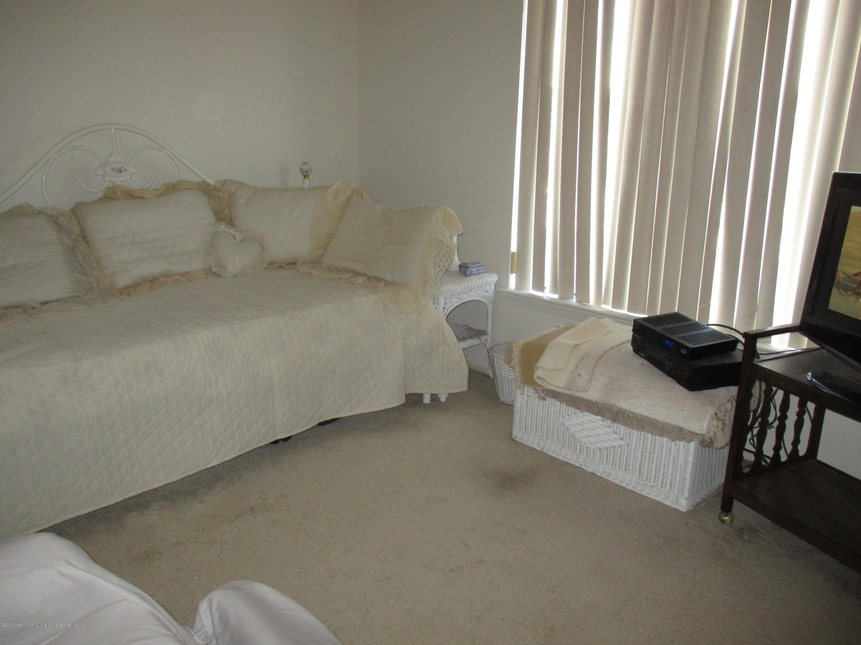 83 Narrows Road North, Unit 2D Staten Island, NY 10305 - Photo 14 of 16 guest BR to window