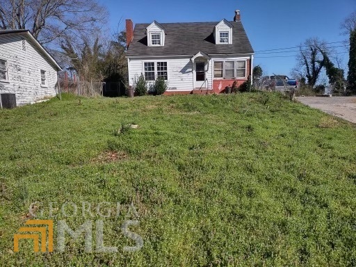 30 Ross Street Northeast Rome, GA 30161 - Photo 1 of 1 a front view of a house with a yard