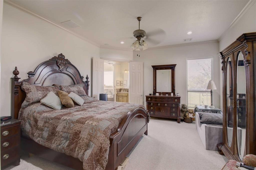 3705 Canyon Pass Trail Burleson, TX 76028 - Photo 13 of 32 a bedroom with a bed couch and a window