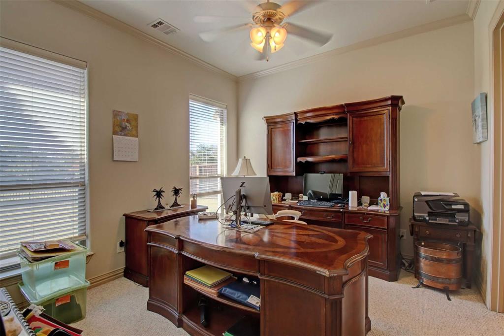 3705 Canyon Pass Trail Burleson, TX 76028 - Photo 19 of 32 a room with furniture a flat screen tv and a window