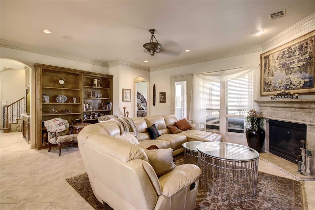 3705 Canyon Pass Trail Burleson, TX 76028 - Photo 3 of 32 a living room with furniture and a fireplace