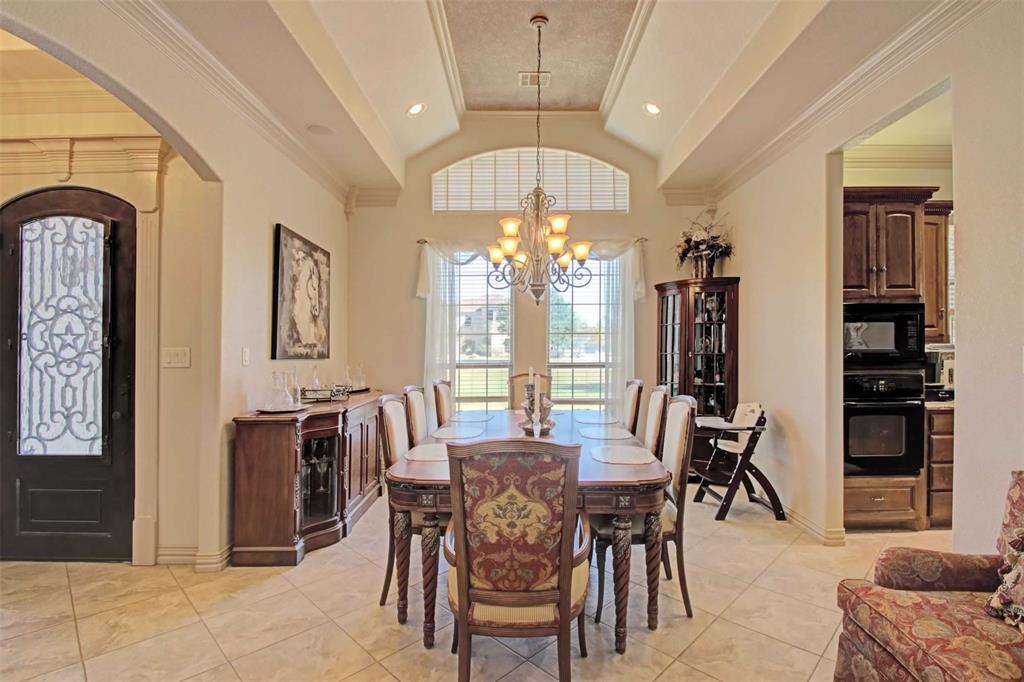 3705 Canyon Pass Trail Burleson, TX 76028 - Photo 8 of 32 a view of a dining room with furniture window and outside view