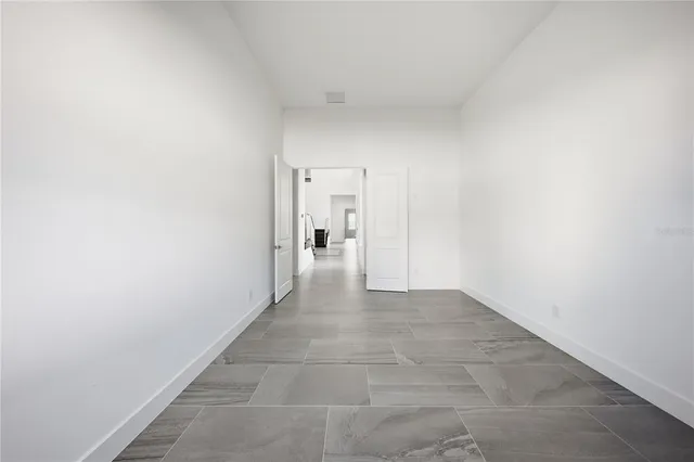a bathroom with a sink a shower and a mirror