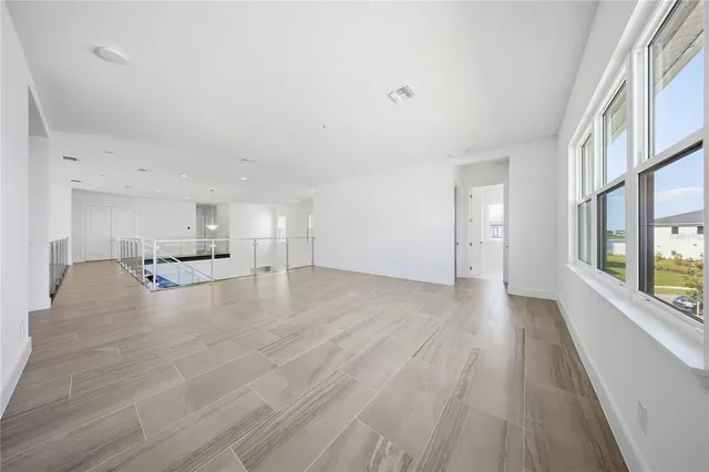 a view of a city with lawn chairs