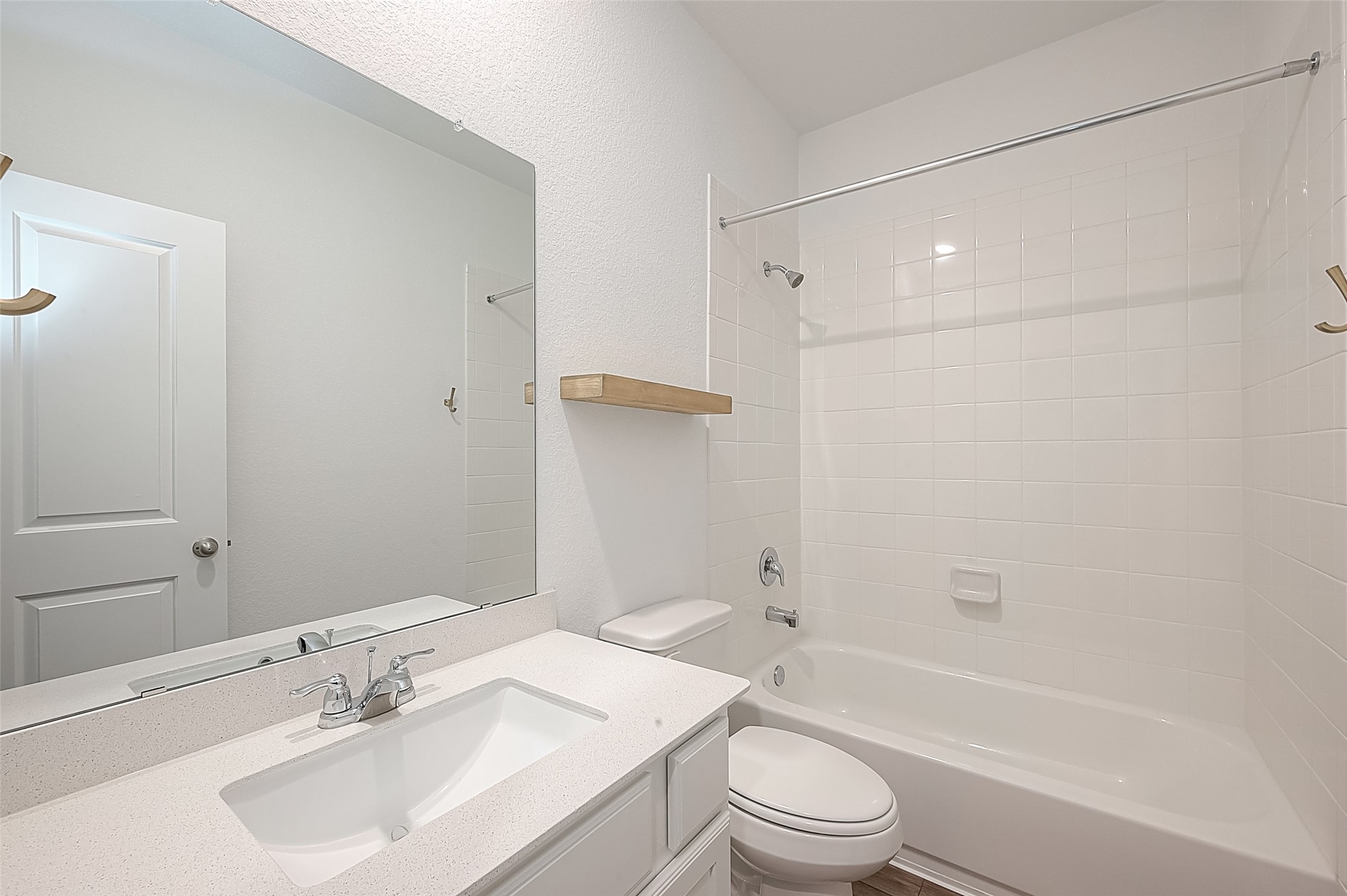 516 Timber Voyage Court Conroe, TX 77304 - Photo 12 of 25 a bathroom with a sink a toilet and a bathtub