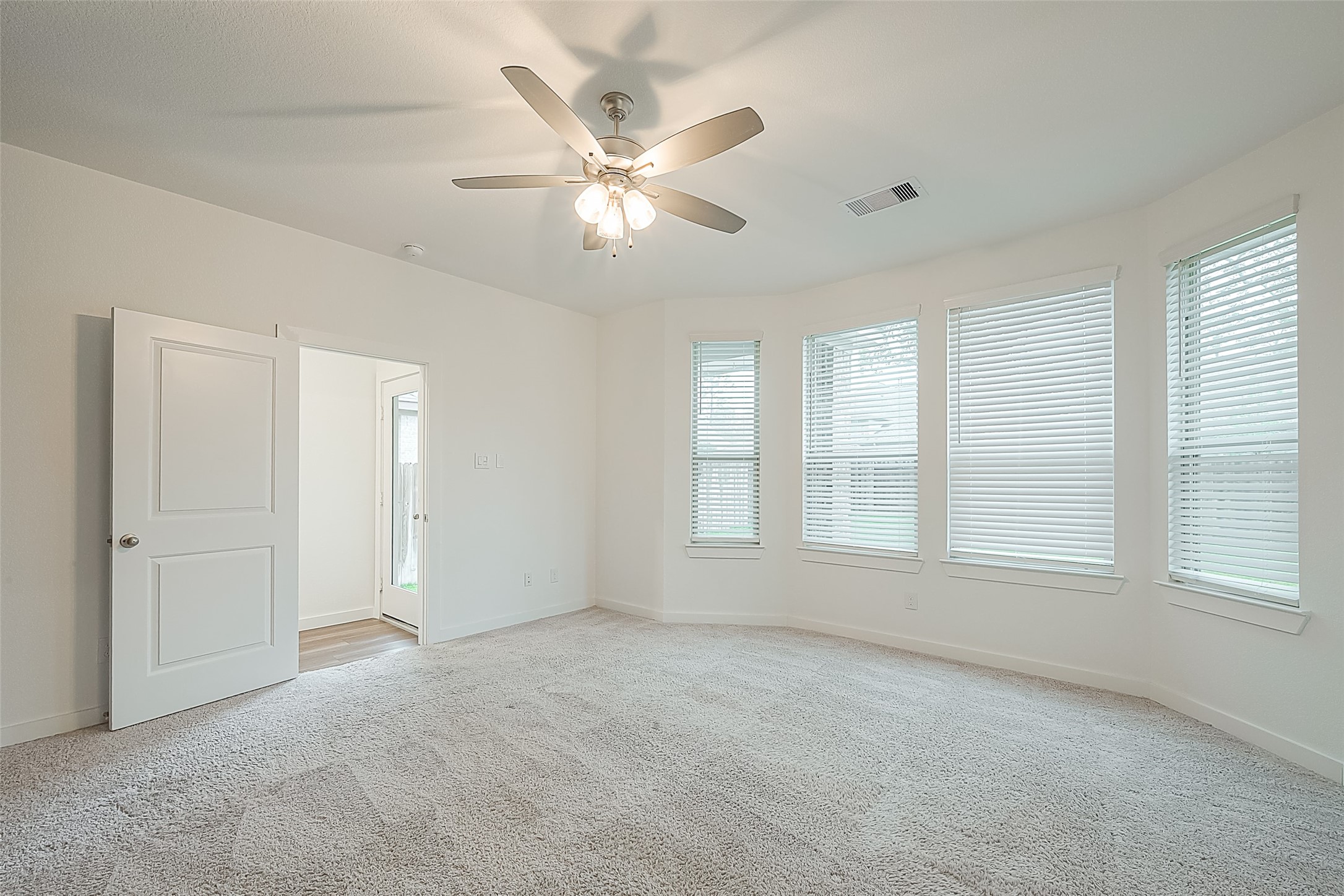 516 Timber Voyage Court Conroe, TX 77304 - Photo 16 of 25 a view of an empty room with a window