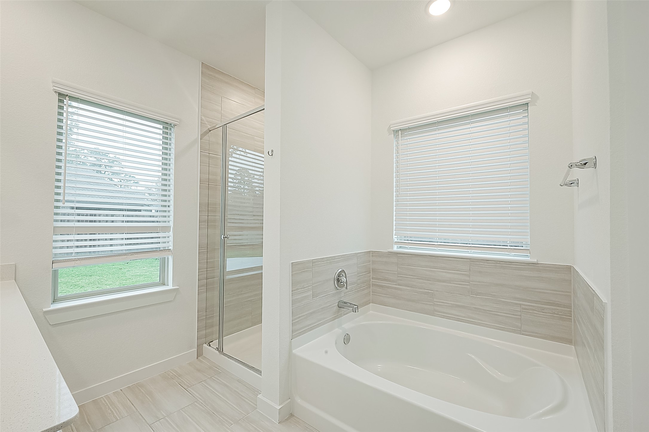 516 Timber Voyage Court Conroe, TX 77304 - Photo 18 of 25 a white bath tub sitting next to a window