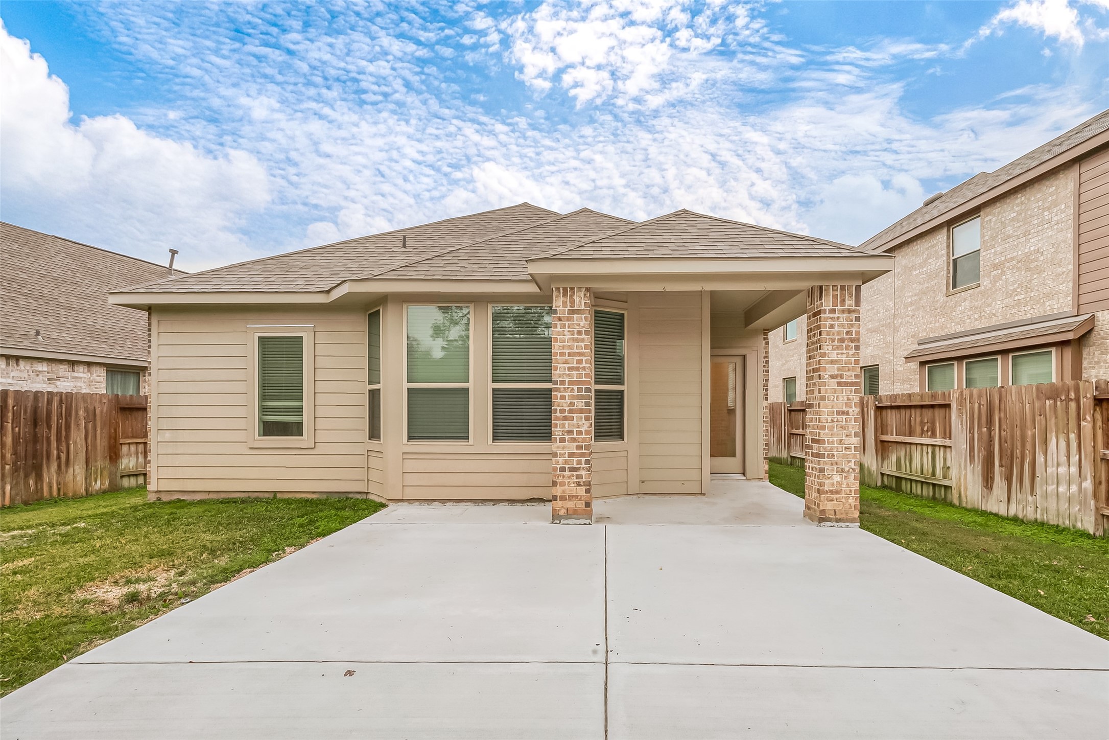 516 Timber Voyage Court Conroe, TX 77304 - Photo 21 of 25 a front view of a house with a yard