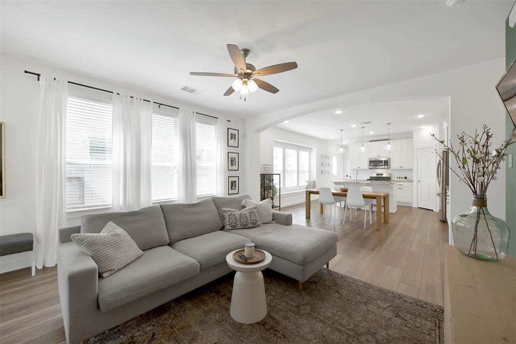 516 Timber Voyage Court Conroe, TX 77304 - Photo 5 of 25 a living room with furniture and a large window