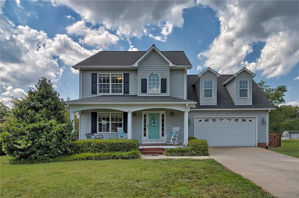 224 Maple Ridge Circle Salisbury, NC 28147 - Photo 1 of 43 a front view of a house with a yard and garage