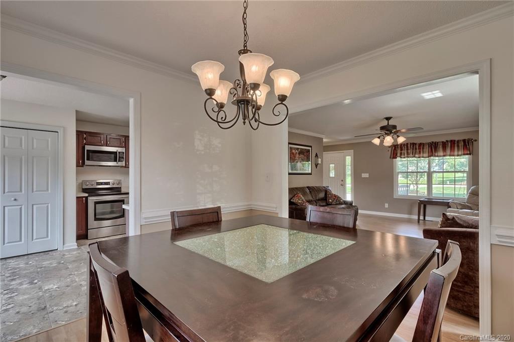 224 Maple Ridge Circle Salisbury, NC 28147 - Photo 14 of 43 a view of a dining room and livingroom