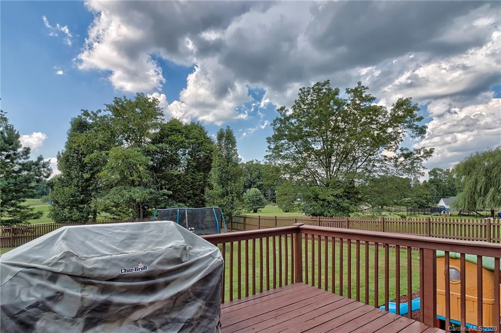 224 Maple Ridge Circle Salisbury, NC 28147 - Photo 41 of 43 a view of balcony with wooden floor and fence