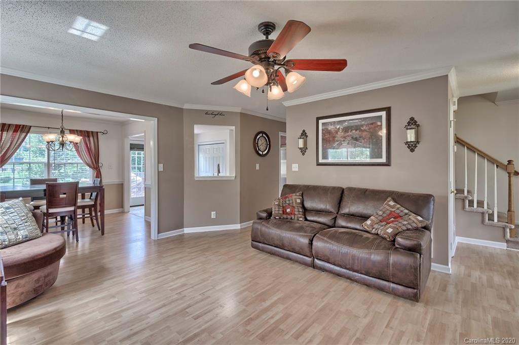 224 Maple Ridge Circle Salisbury, NC 28147 - Photo 10 of 43 a living room with furniture and a large window