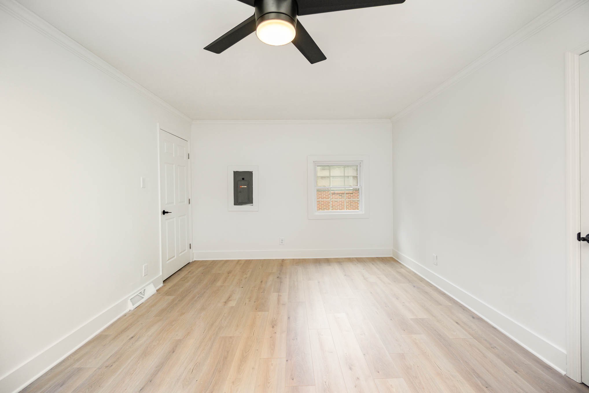 1401 Manor Road Columbia, TN 38401 - Photo 28 of 35 an empty room with a hardwood and ceiling fan